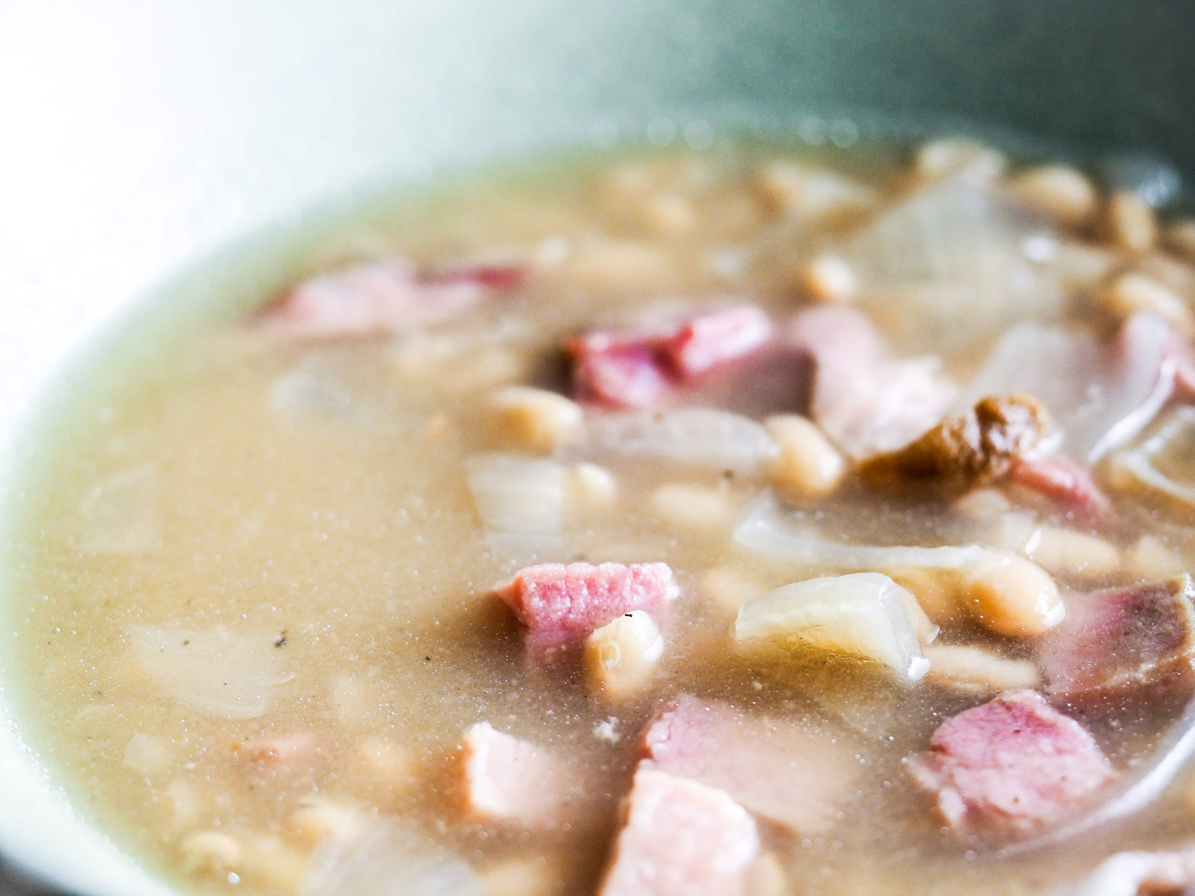 close up of soup in green bowl