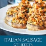 italian sausage stuffed mushrooms arranged on a white plate for serving