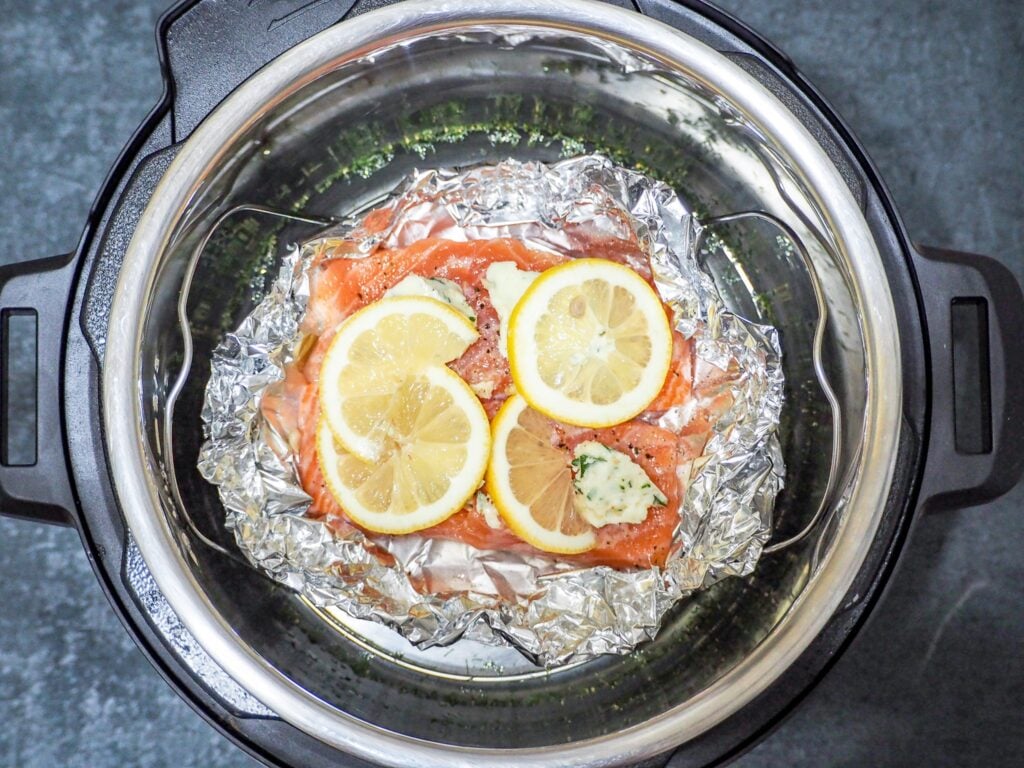 salmon in instant pot in foil with herbs and lemon slices
