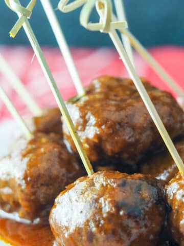 meatballs on plate with toothpicks for serving