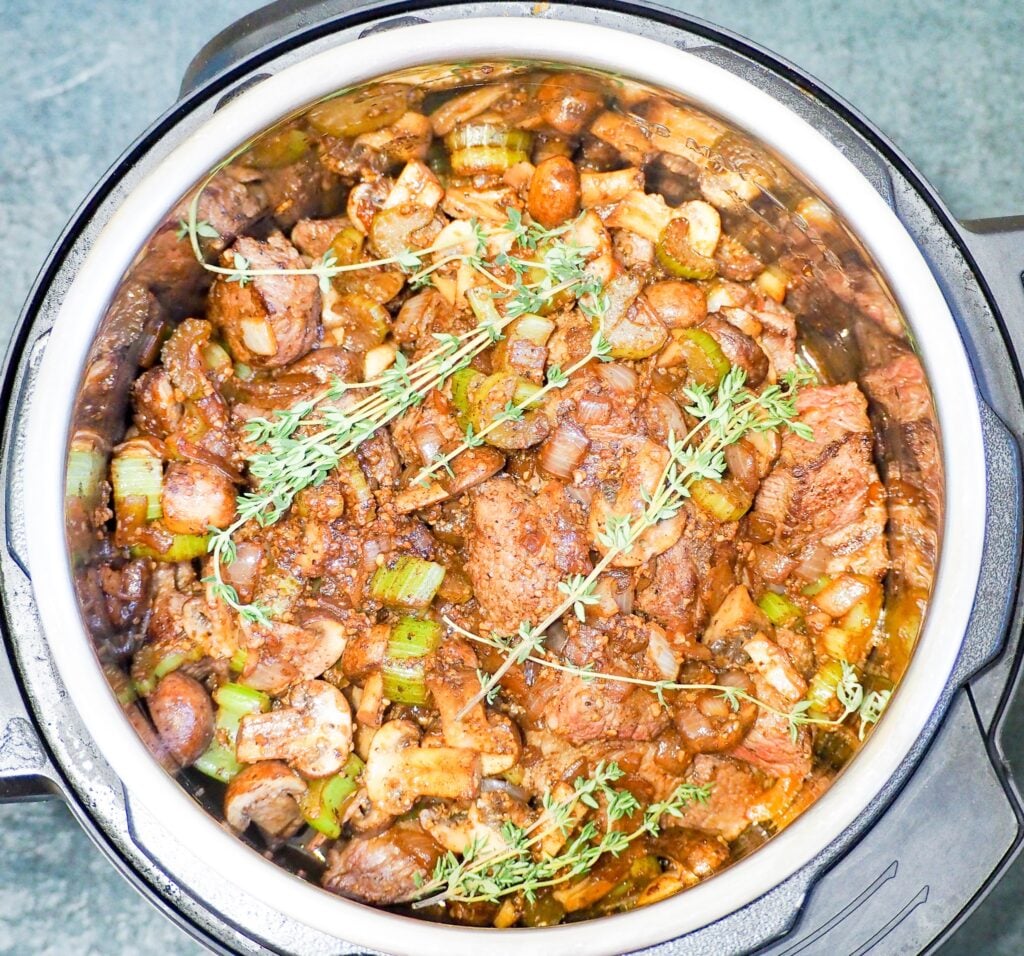 overhead shot of beef stew prep in the instant pot