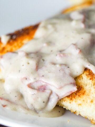 toast points on white plate with creamed chipped beef