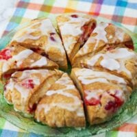 overview shot of cherry scones wedges on green plate