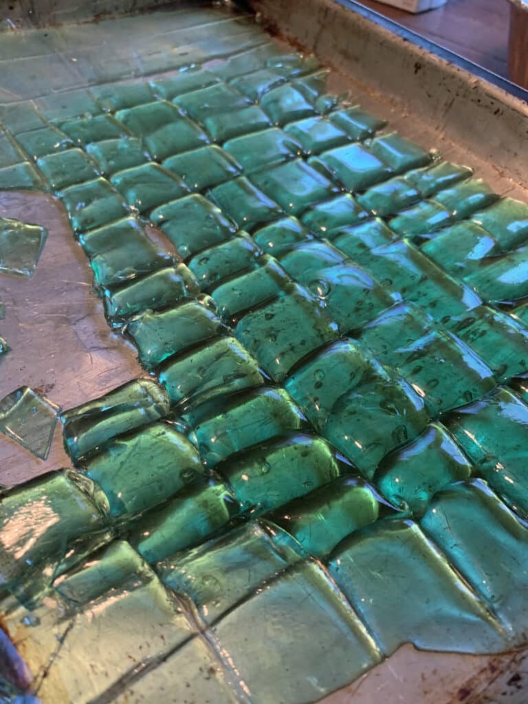 hard tack candy drying on baking sheet that has been cut into pieces