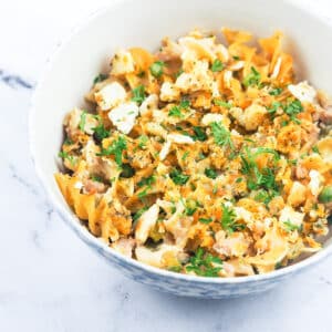 bowl of tuna noodle casserole on marble counter top