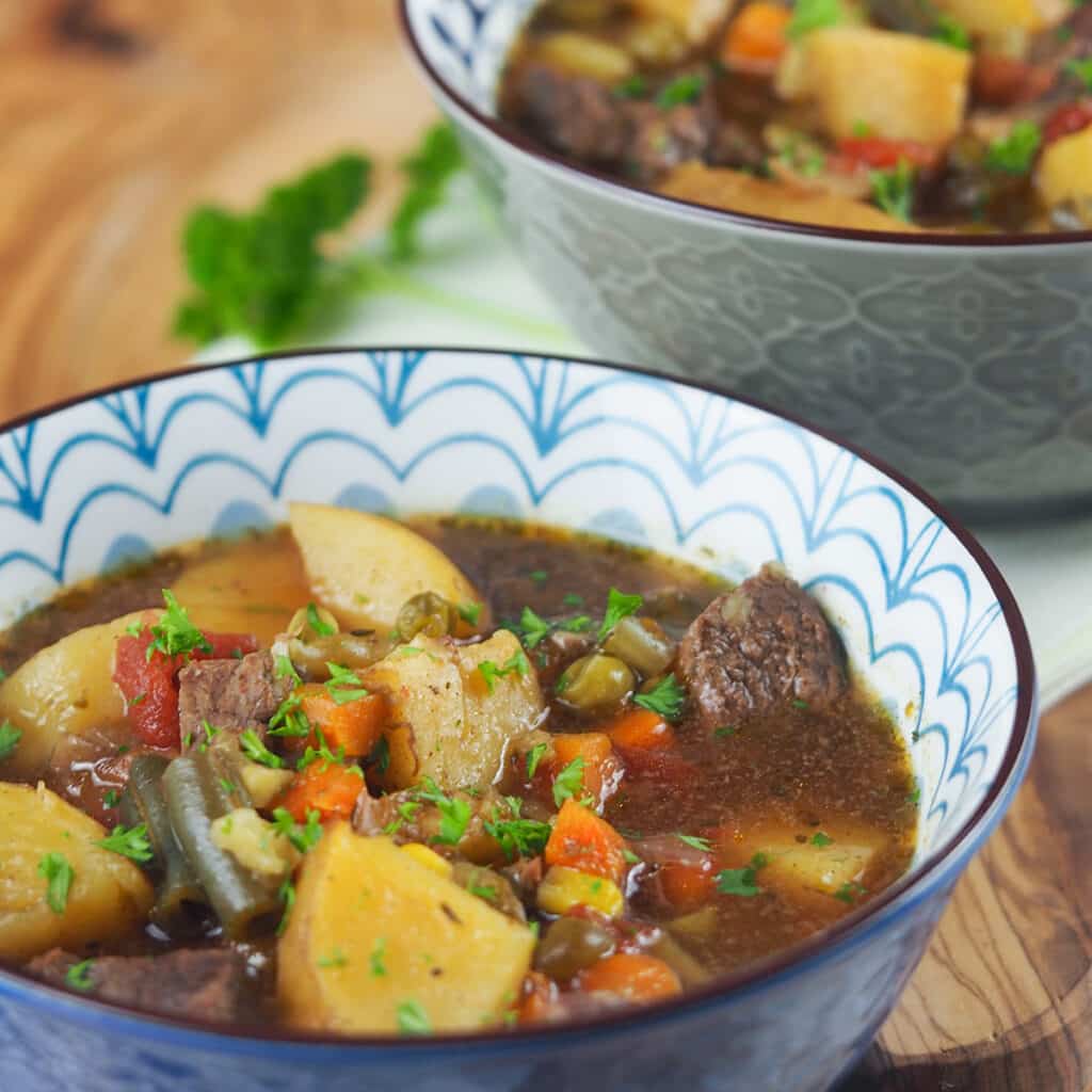 vegetable soup in blue bowl