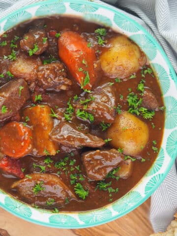 goulash with potatoes and carrots in bowl