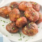 roasted potatoes topped with kosher salt and chives