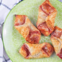 strawberry danishes on green plate