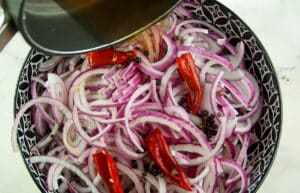 pour hot vinegar mixture over vegetables